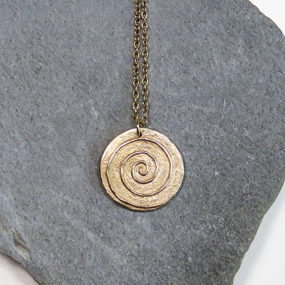 Kozmicni-obesek-spirala-bron-verizica